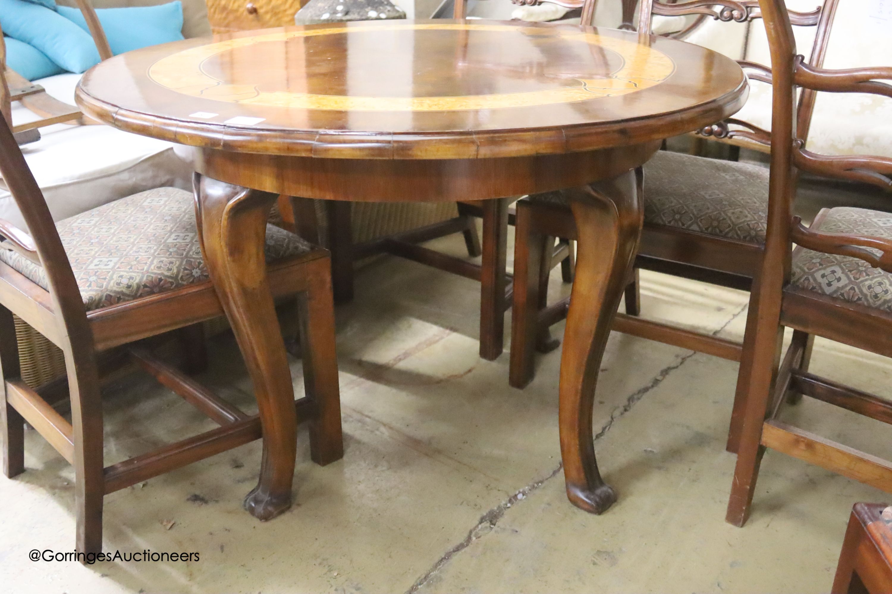 A parquetry inlaid circular centre table, 112cm diameter